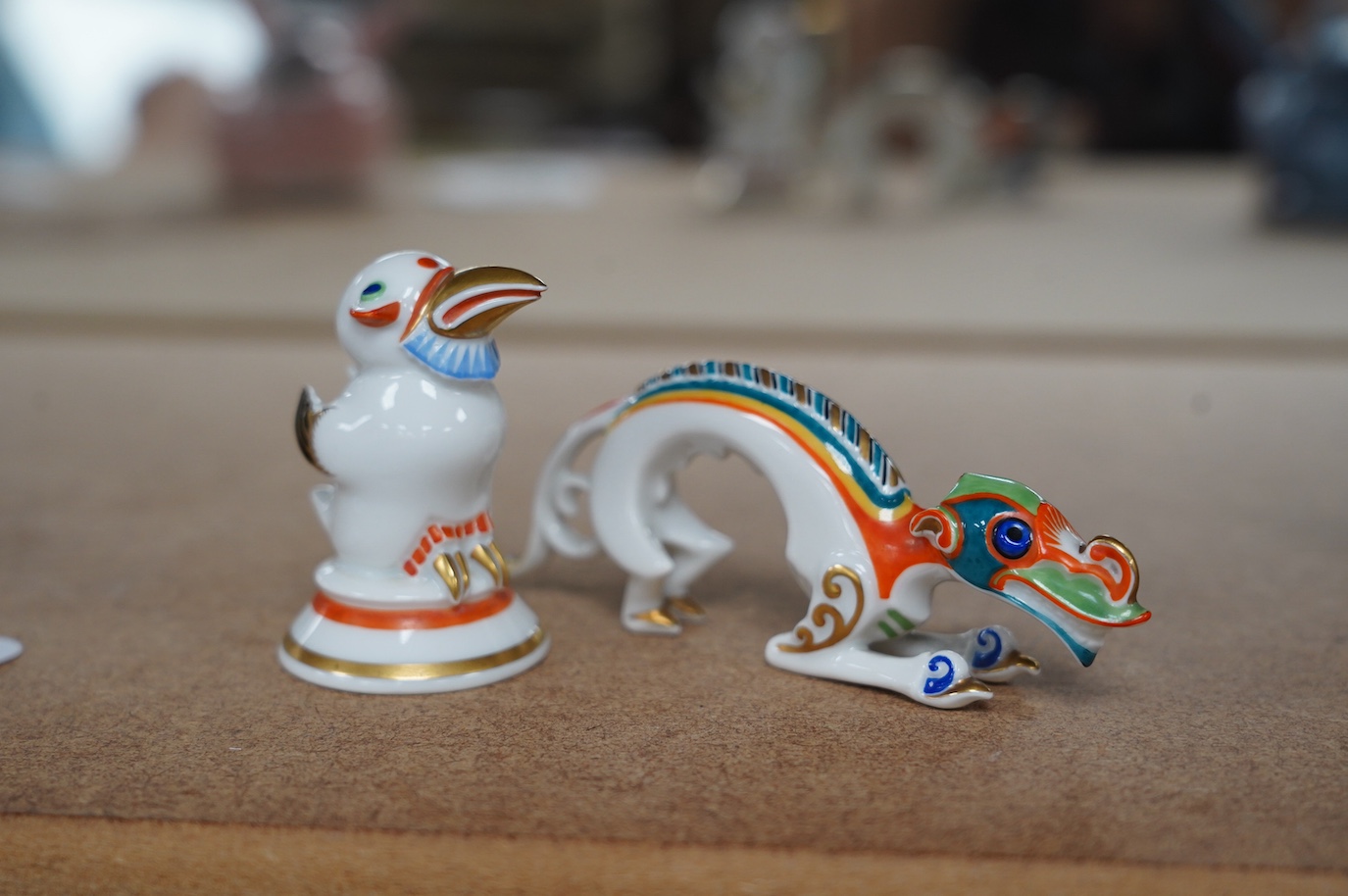 Two Art Deco Rosenthal Selb Bavaria small figures, modelled by Hans Küster, c.1925, comprising 'Schwenk', a Chinese river dragon 11.5cm long, and a stylised bird, 6cm high, Condition - good